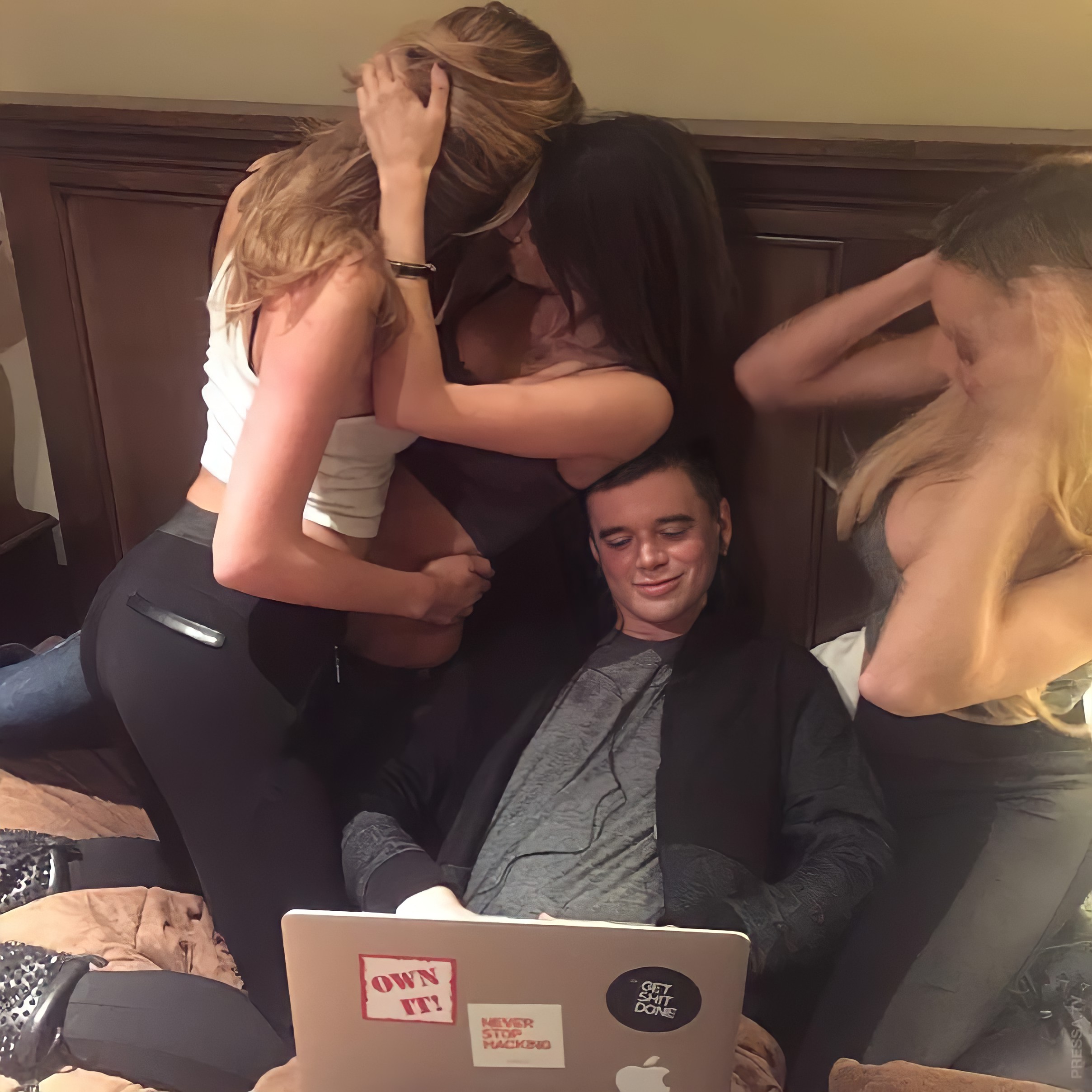 Girls ignoring guy laptop